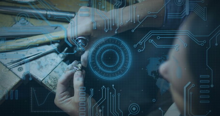 Image of scope scanning and computer circuit board over caucasian man in workshop