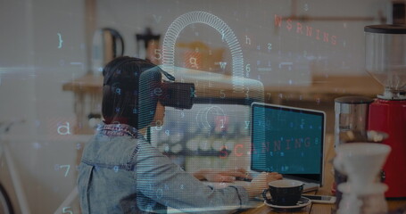 Image of data processing over padlock and biracial woman using vr headset and laptop