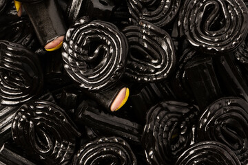 Jelly anise candy. Black jelly candies. Delicious gelatin candies. - obrazy, fototapety, plakaty