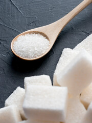 background of white sugar on black