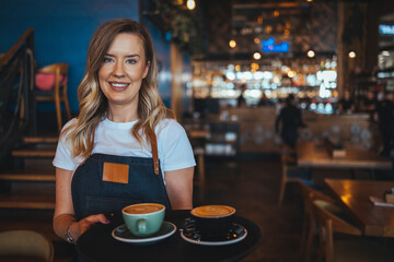 Coffee Business owner Concept - attractive young beautiful  barista with apron in coffee shop....