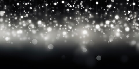 White abstract glowing bokeh lights on a black background with space for text or product display. 