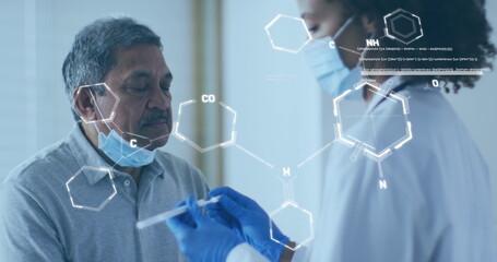 Image of chemical formula over diverse doctor and patient - Powered by Adobe