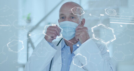 Image of chemical formula over caucasian male doctor wearing face mask