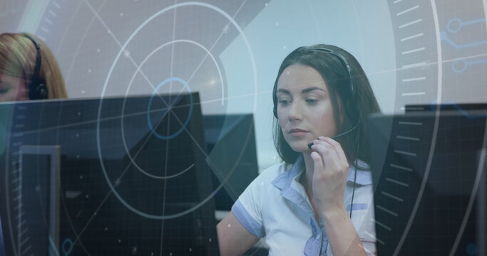Image of data processing over caucasian woman talking on phone headset at office