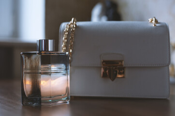Perfume and women's bag. stylish accessories