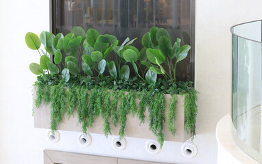 decorative flower bed with artificial plants