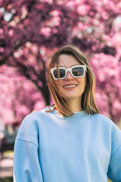 portrait of smiling beautiful woman in sunglasses