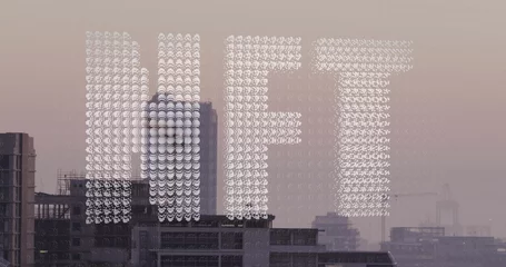 Foto op Plexiglas Image of white particles forming a nft text banner against aerial view of cityscape © vectorfusionart