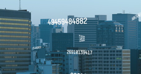 Image of multiple changing numbers against aerial view of cityscape
