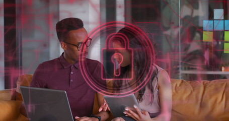 Image of security padlock and connections over diverse business people in office