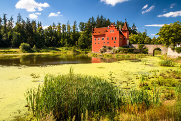 The Cervena (Red) Lhota Chateau is a beautiful and unique example of Renaissance architecture. It is located in the South Bohemian Region of the Czech Republic, surrounded by a picturesque lake. - 785541115