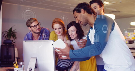 Image of data processing and diagrams over diverse business people discussing work