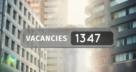 Image of numbers and vacancies text over pedestrians in busy city street