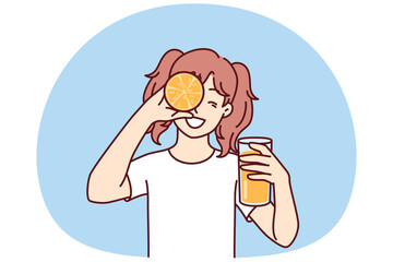 Little girl with glass of orange juice in hands smiling holding half of citrus fruit near face. Happy teenager recommends using orange juice containing healthy vitamins for immunity and health - 785547779