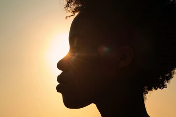 Close-up of a person's silhouette, representing different ethnicities, against a backdrop of...