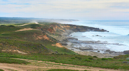 land and seascape at the rocky coastline of the Atlantic Ocean near Porto Covo near Sines, Portugal, Europe - 785549728