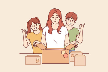 Mother and children prepare donation boxes, wanting to be useful to society and volunteer. Happy family calls for donation to charitable foundations that need help from caring people