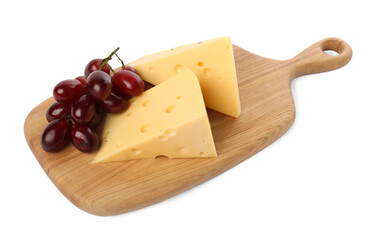 Pieces of delicious cheese and grapes isolated on white