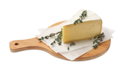 Board with piece of tasty camembert cheese and thyme isolated on white