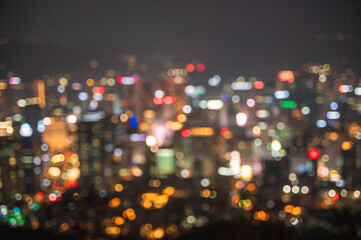 Blurred Seoul, South Korea night time cityscape background 