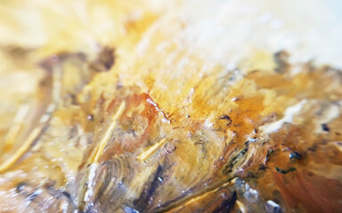 messy artists palette with oil paints of ocher shades