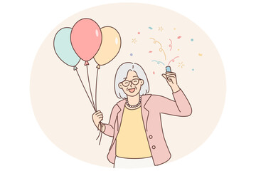 Smiling elderly grandmother celebrate birthday