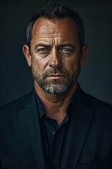 Man with beard and black shirt