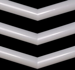 A set of chevrons in white isolated on a black background