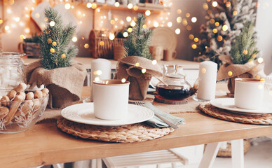 Shelves with glass jars filled with sweets in candy store or coffee shop during Christmas holidays.