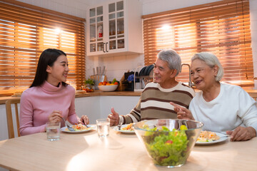 Capture the Joy of Family: Happy Grandparents Enjoying Retirement Indoors, Hugging Their Children and Grandchildren on a Couch, Sharing Smiles and Togetherness Across Generations