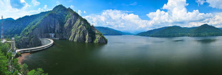 Vidraru dam. An arched, made from concrete - huge reservoir, placed in Capra Valley, surrounded by...