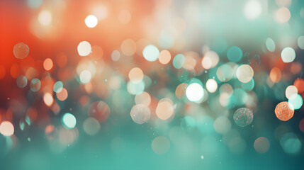 Silver bokeh on defocused teal green and coral colors background. Abstract blur bokeh background