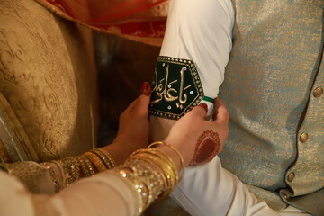 hands of the indian, pakistani wedding culture, bangles, henna on woman hands