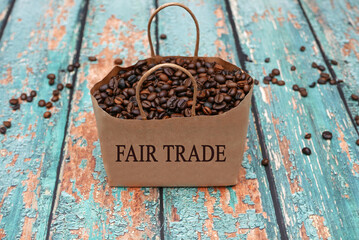Fair trade coffee: A paper bag with fair trade coffee beans.