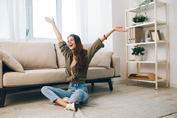 Woman Relaxing on a Cosy Sofa in a Modern Apartment
