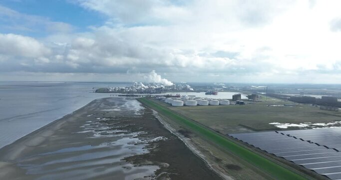 aerial drone on the intermodal tank terminal Terneuzen and DOW chemical park. Along the Western Scheldt. Industrial distribution and blending, production of chemicals. The Netherlands.