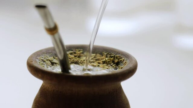 A traditional South American infusion called yerba mate. It is a typical social drink from Argentina, Uruguay, Brazil, and Paraguay