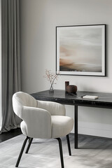 A framed picture on an office wall, a black marble desk with a white armchair, minimalistic interior design photography in a Scandinavian style featuring beige and grey colors.