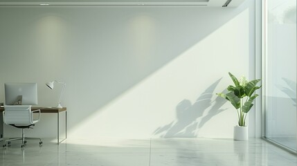 An office with sleek lines and a blank wall, lit brightly by natural light.