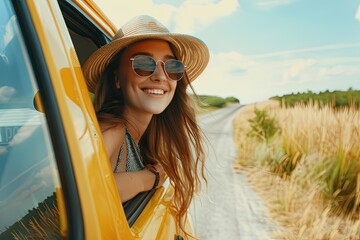 A happy woman enjoys a car ride during a summer trip, a happy young smiling girl in sunglasses and a hat.