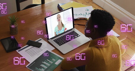 Image of 6g over african american woman having image call on laptop