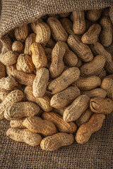Close-up view of peanut in sack bag. Food background.
