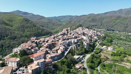 Fototapeta na wymiar Aerial view of the medieval hill town of San Fili with its skyline. Province of Cosenza, Calabria, Italy.