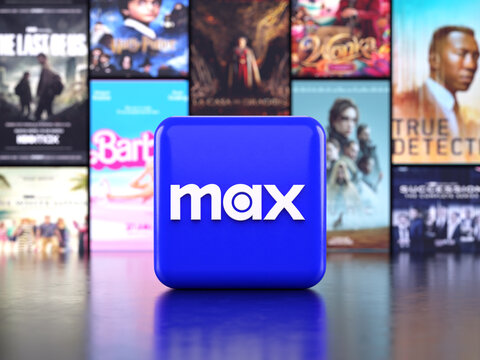 Valencia, Spain - April, 2024: New Max app logo in front of posters of series and movies available on the platform, 3D illustration. Max is the product of the union between HBO Max and Discovery+