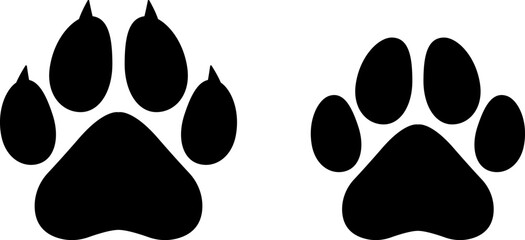 Fototapeta premium Cat and dog paw prints icons vector image. The paw print saddles of the canine and kitty families. Animal print clip art.