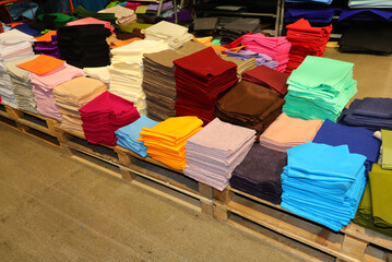 colorful felt fabrics for sale on pallets in the hobby shop