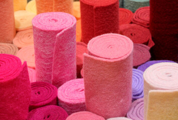 Colorful felt rolls for sale in a craft store for making handmade crafts - 785639984