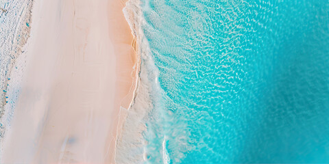 Surf line on the sea coast with white sand and turquoise water
