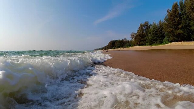 Azure Sea, resort. Tropical seashore scenic off Phuket beach Thailand with wave crashing on sandy shore. Amazing travel and tour background